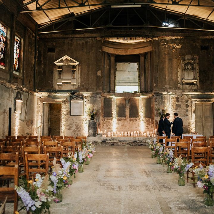 Groomsman at the stunning Asylum Chapel wedding venue with stained glass windows