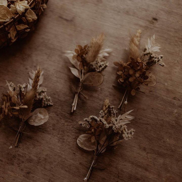 Dried flower buttonholes with dried confetti