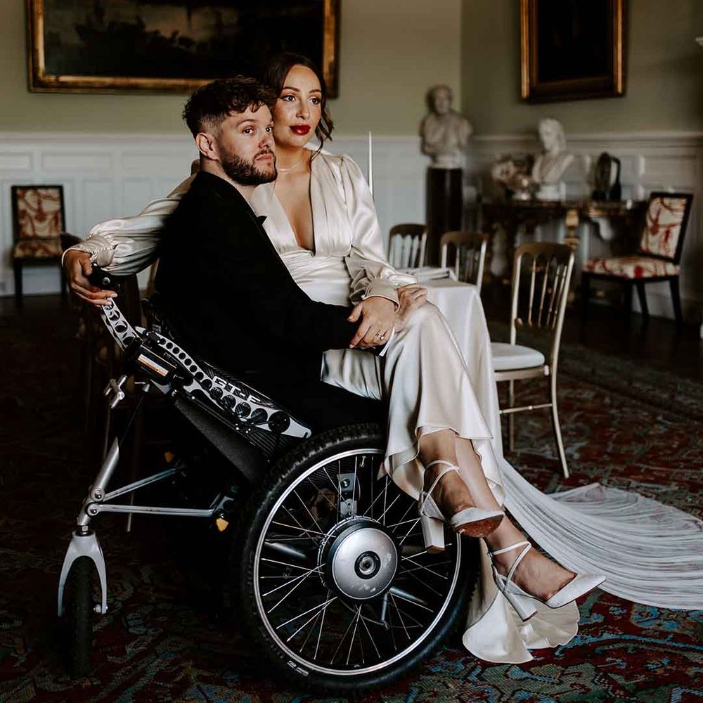 Capesthorne Hall wedding with interabled couple in a tuxedo and satin wedding dress