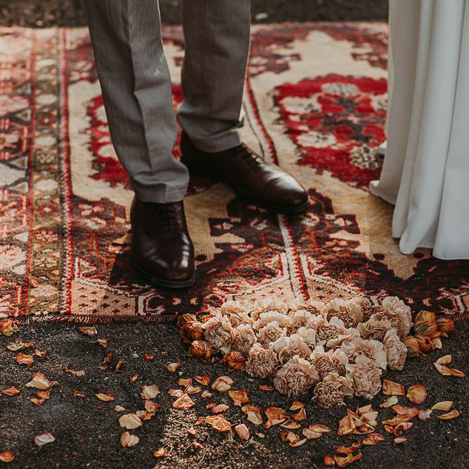 Woolen Rug and flower at the altar 