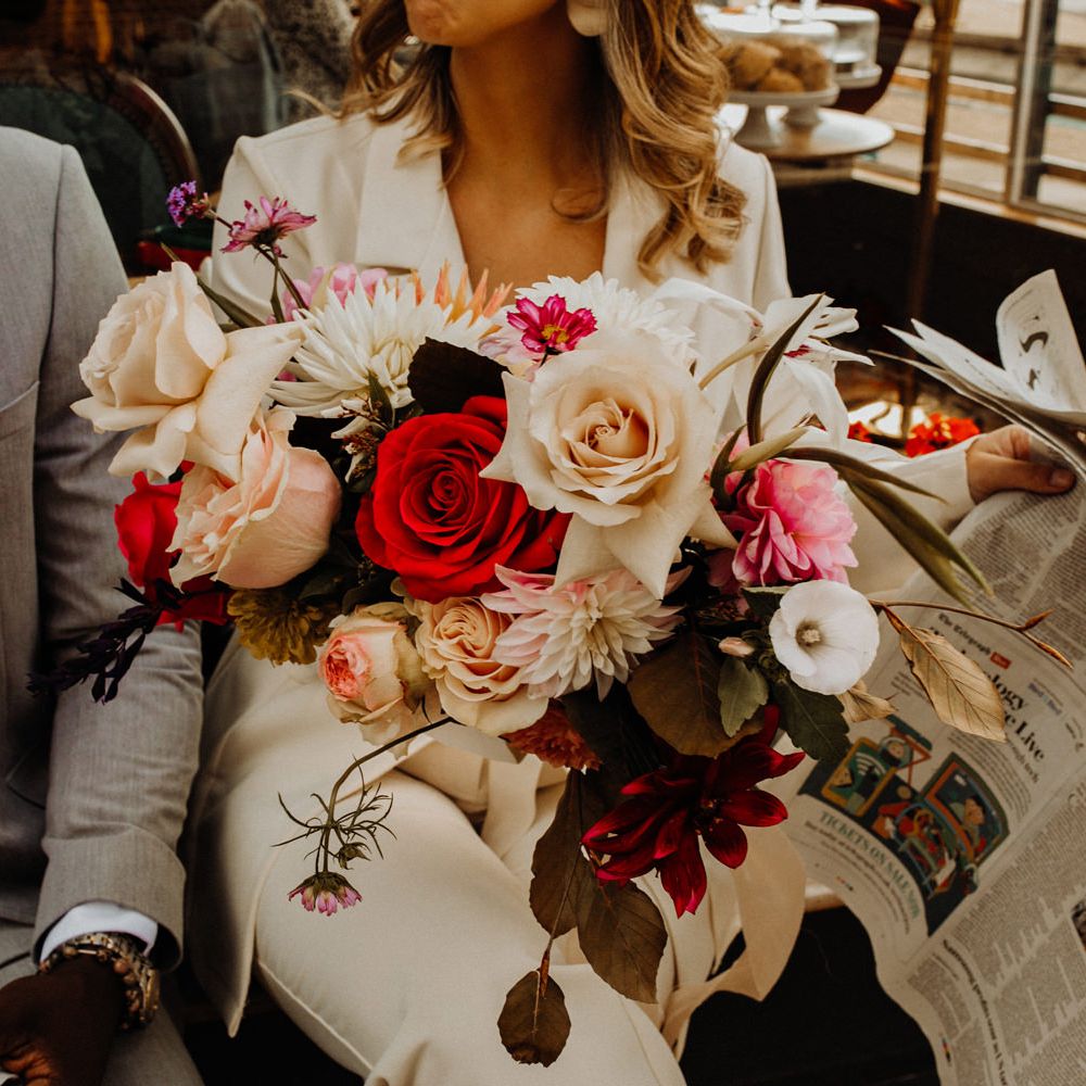 Pink, red and ivory wedding bouquet for city elopement 