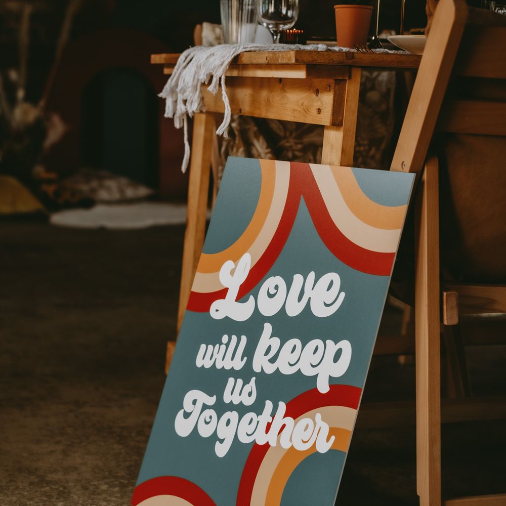 70s retro wedding sign with mustard and teal colours 