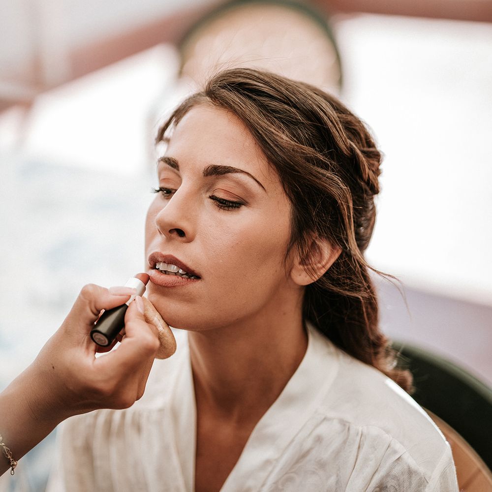 Natural bridal makeup for bride with half up half down wedding hair 