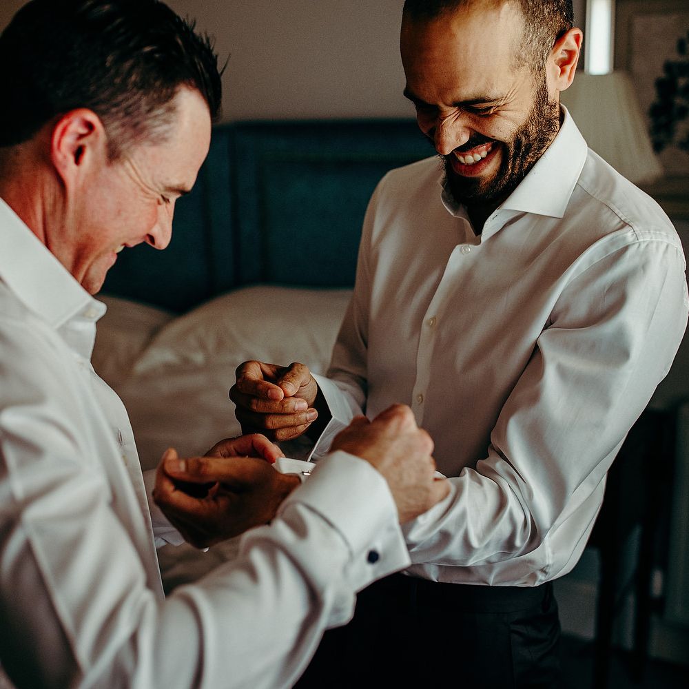 Groom gets ready for wedding morning