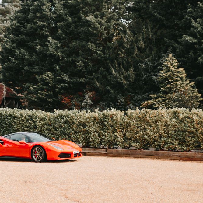 Red sports wedding car 