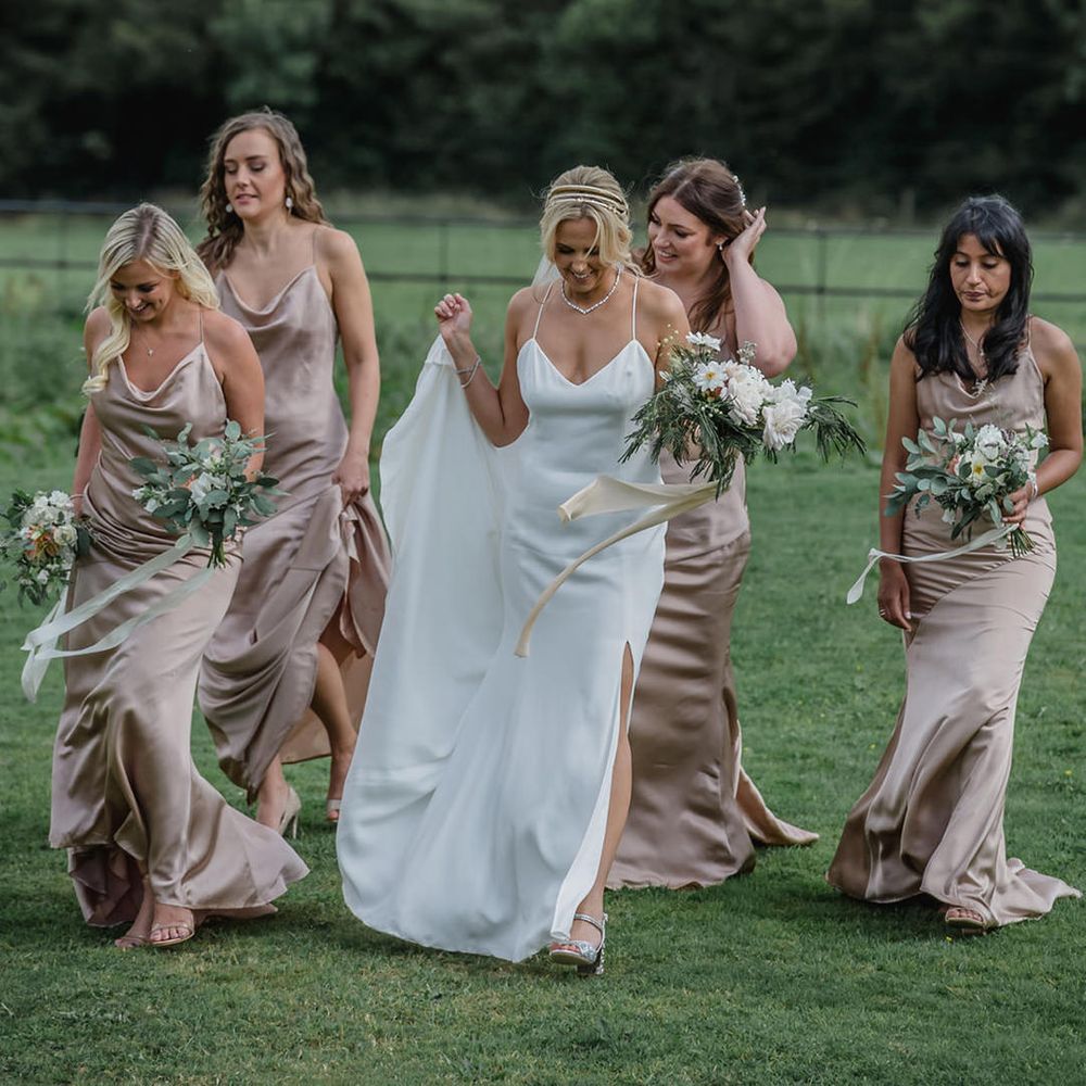 Bridal party make their way through Trevenna Barns gardens