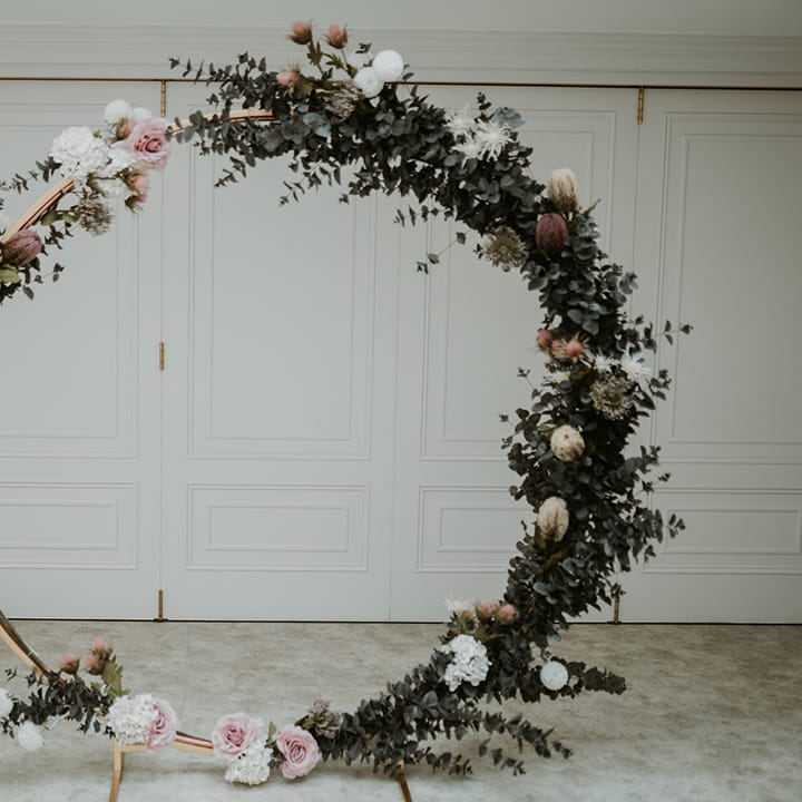 Floral archway complete with pastel florals 