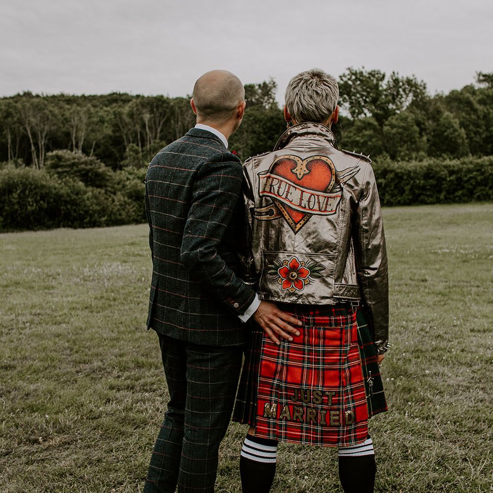 Groom wears personalised gold leather jacket complete with True Love on his wedding day