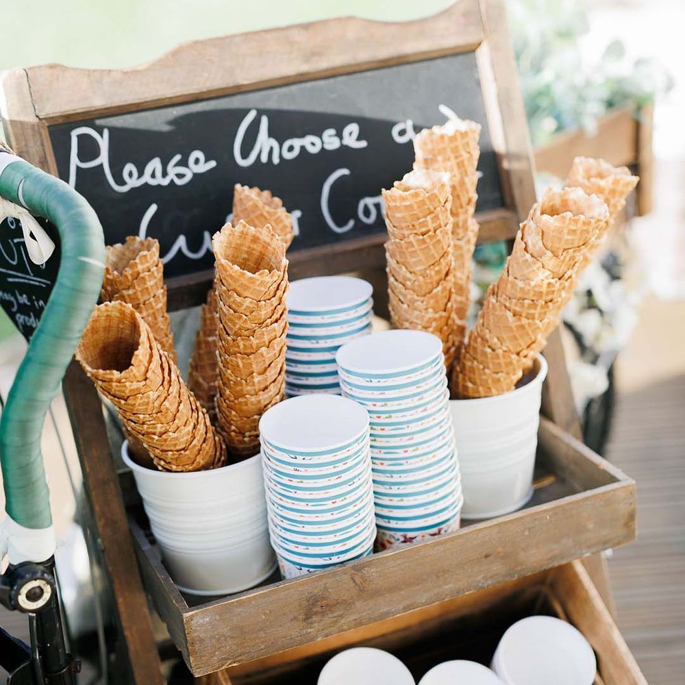Ice cream cones and tubs wedding food 
