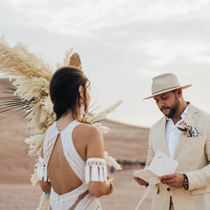 Groom wearing beige neutral wedding hat for wedding ceremony in Morocco 