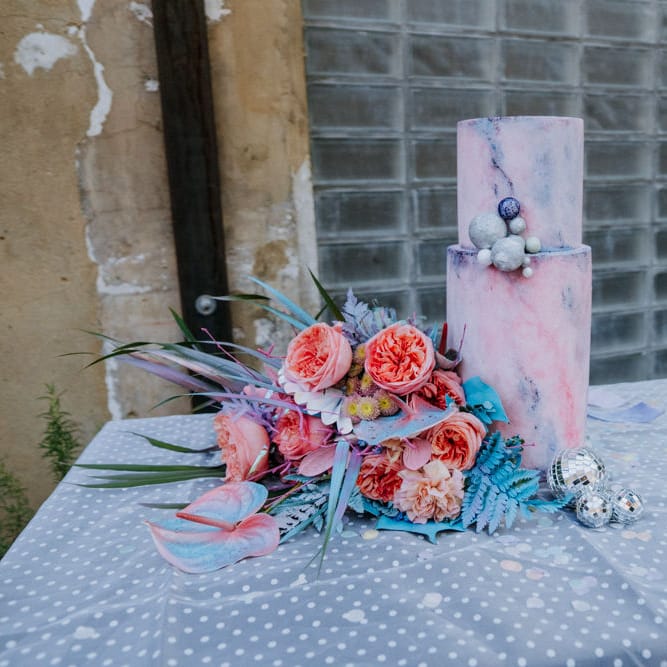 Wedding cake and bouquet in holographic pastel colours 
