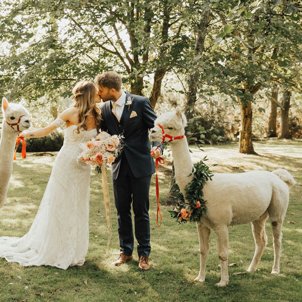 Bride in Clara Rue De Seine Dress and Groom in bespoke subtle check 3 piece suit