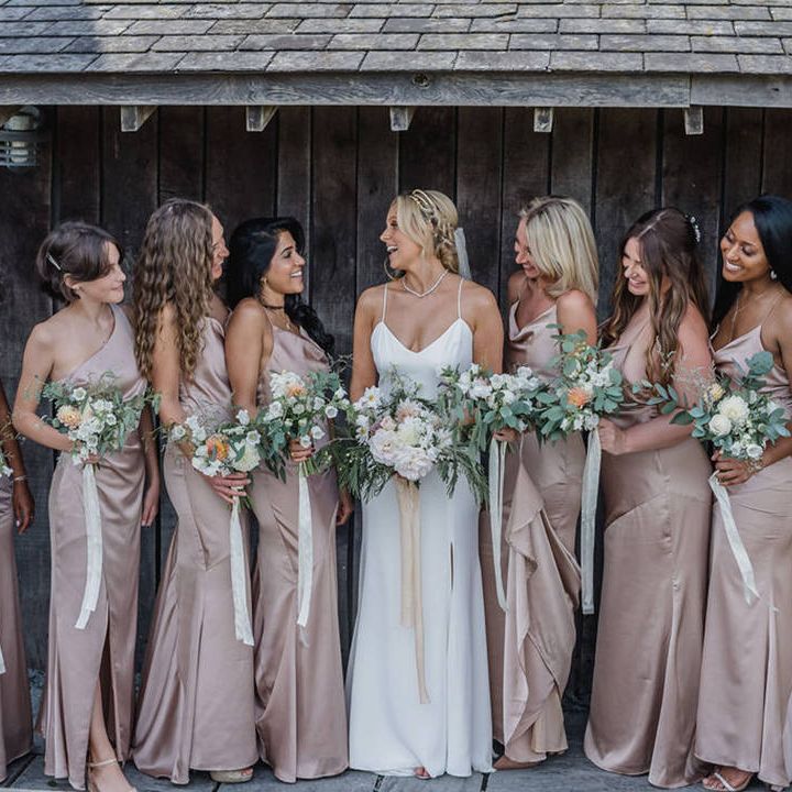 Pink satin bridesmaid dresses and blush bouquets