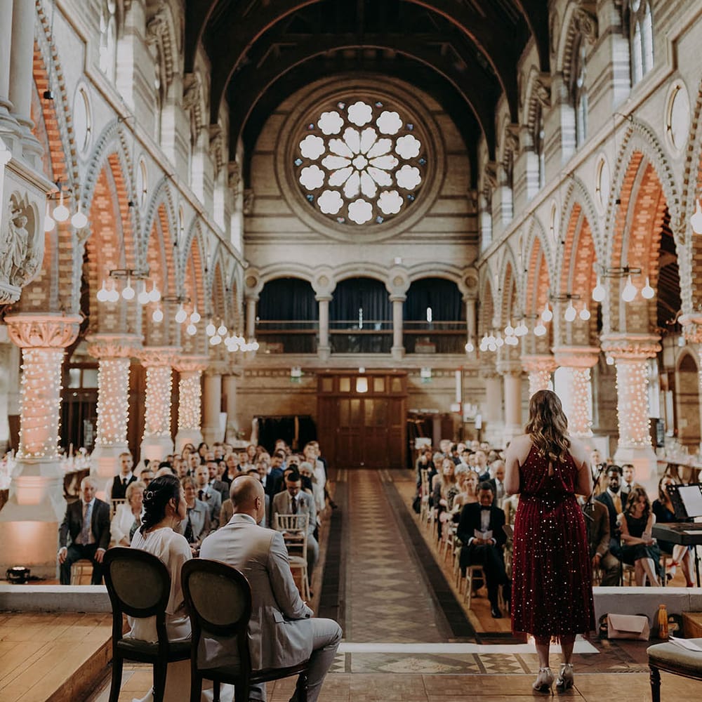  Bride & groom sit at the front of church on their wedding day | Irene Yap Photography