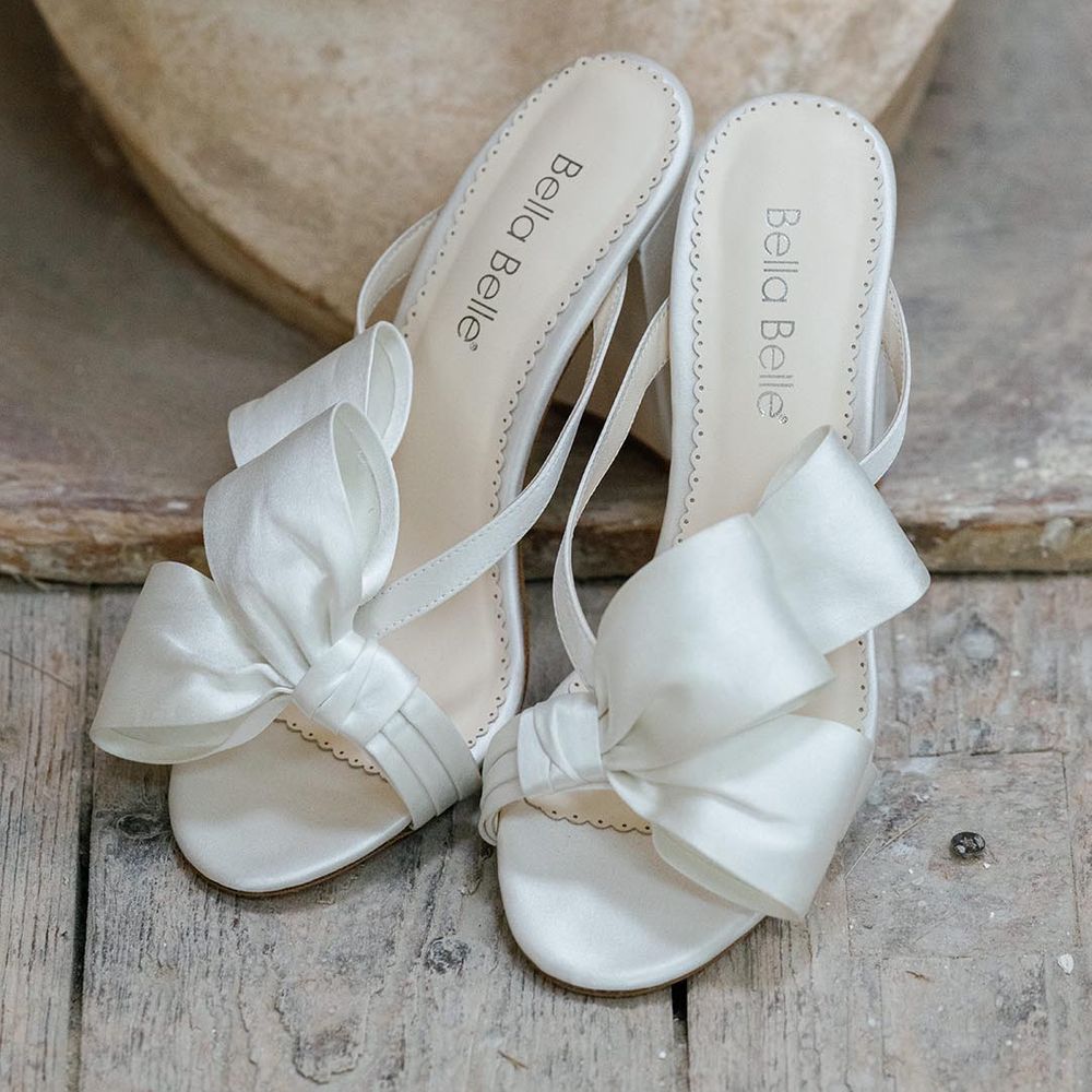 Block heel white wedding mules with half bow detail from Bella Belle Heart & Soul Collection