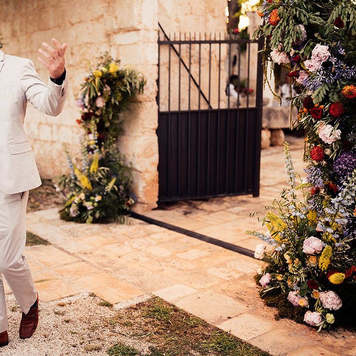 Wedding guest delivers a speech at the rustic Italian destination wedding 