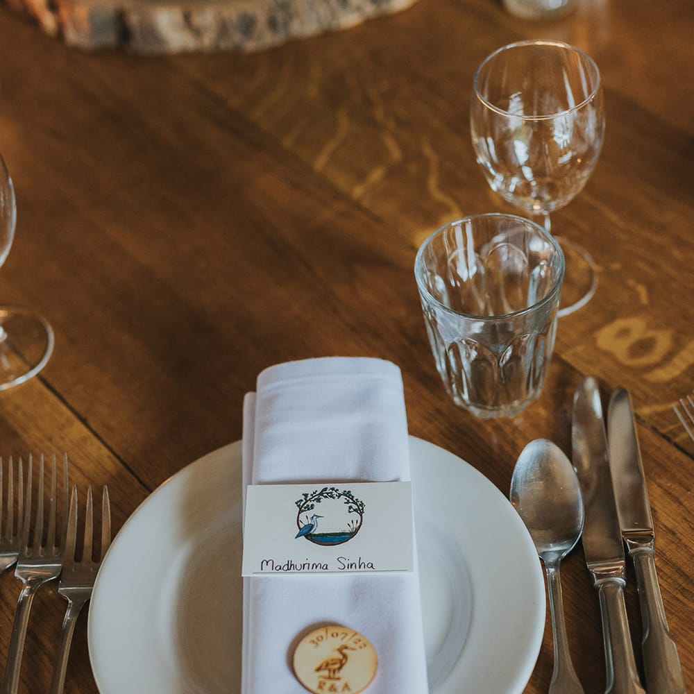 place setting wedding table decorations with heron etched wooden disc