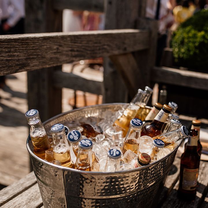 Ice bucket full of Corona bottles of beer