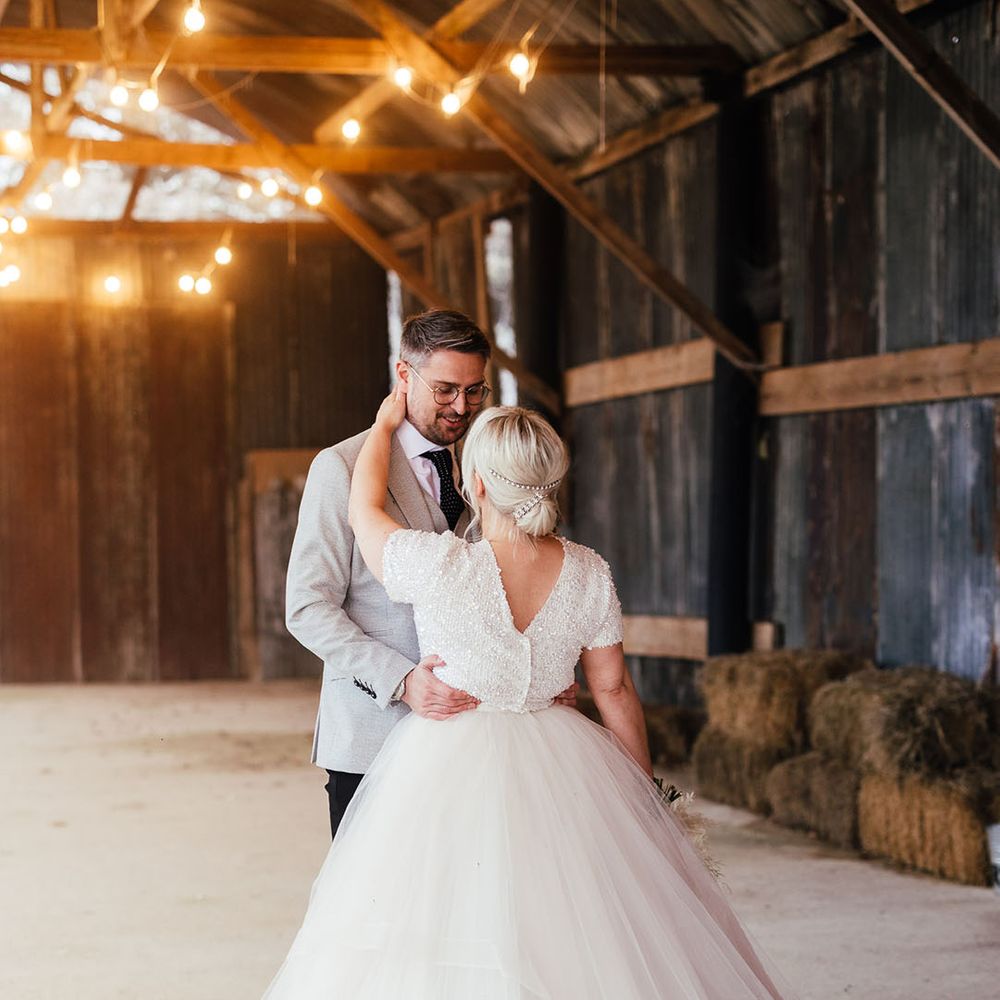 Bride in princess style bridal separates spinning her skirt around at the grounds of Silchester Farm wedding venue