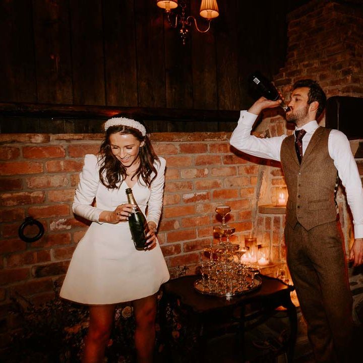 Bride and groom enjoying some wedding champagne at Willow Marsh Farm Loughborough 