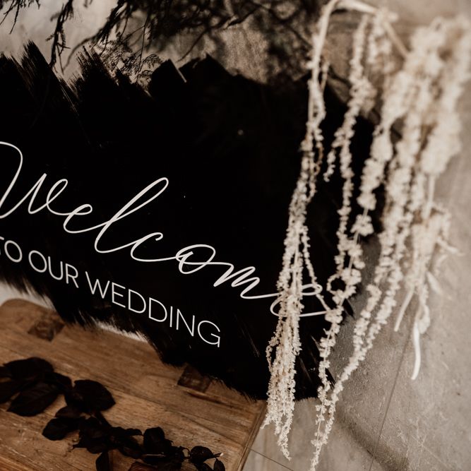 Black welcome sign for wedding 
