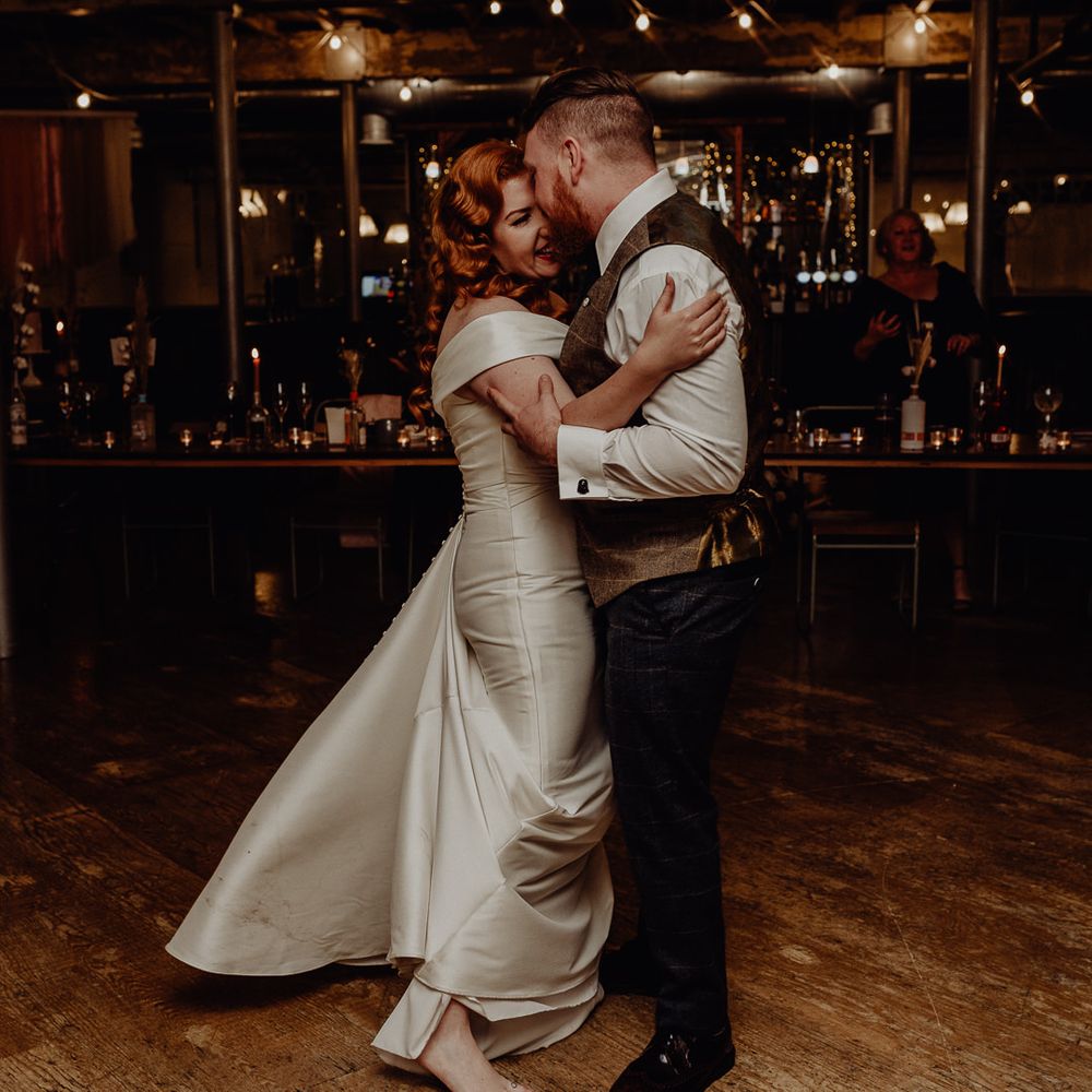 Bride and groom dancing at their intimate micro wedding 
