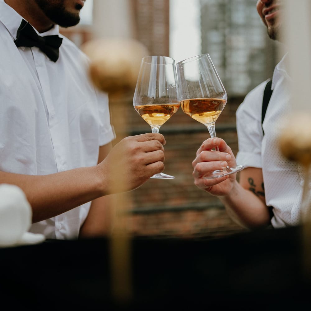 Grooms cheers at New York wedding