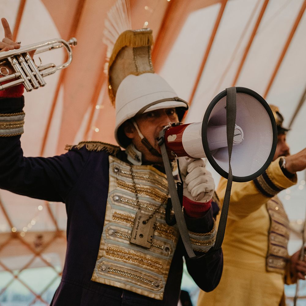 Wedding band entertainment has a megaphone during reception