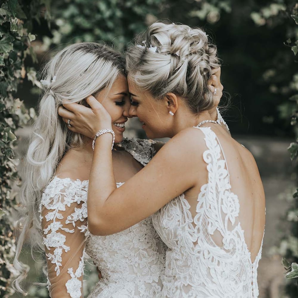 Newlyweds embrace each other for wedding portraits at Crab & Lobster fairytale wedding