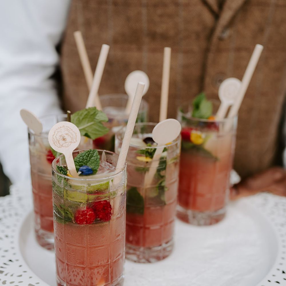 Signature cocktails complete with personalised wooden stirrer 