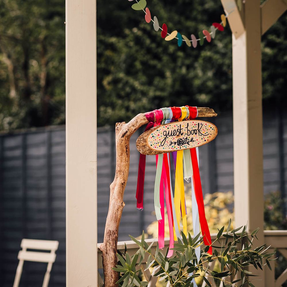 Colourful DIY ribbon rainbow decoration and welcome sign 
