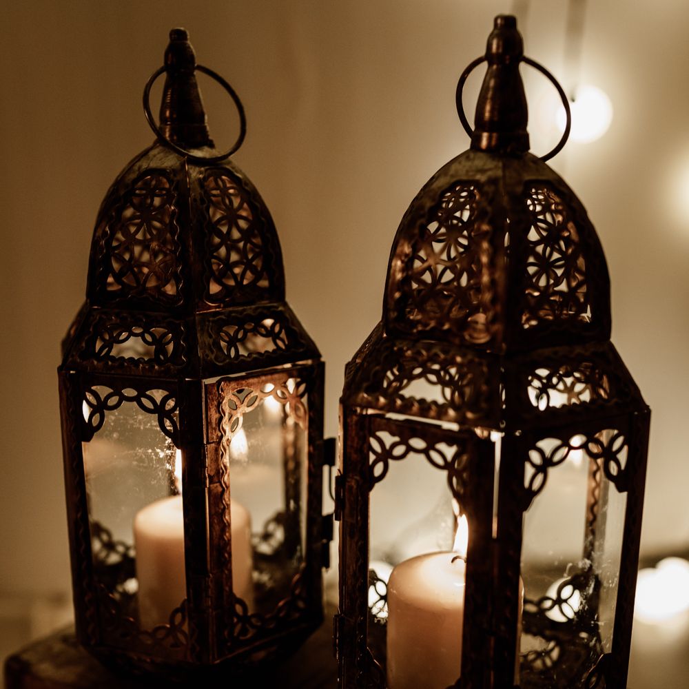 Bronze lanterns with candles 