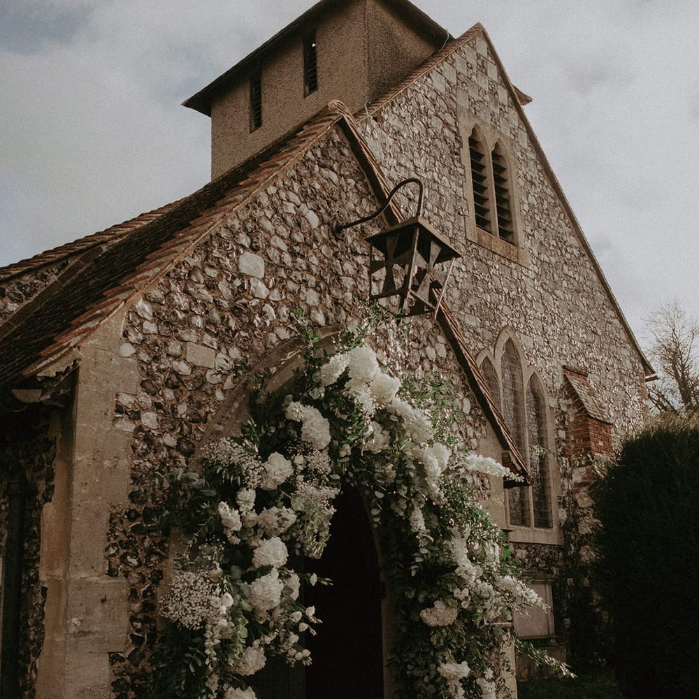 Large white mixed flower arch at Hedsor House wedding 