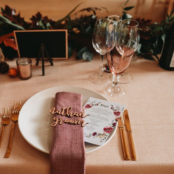 Place setting with napkin and lazer cut name place 