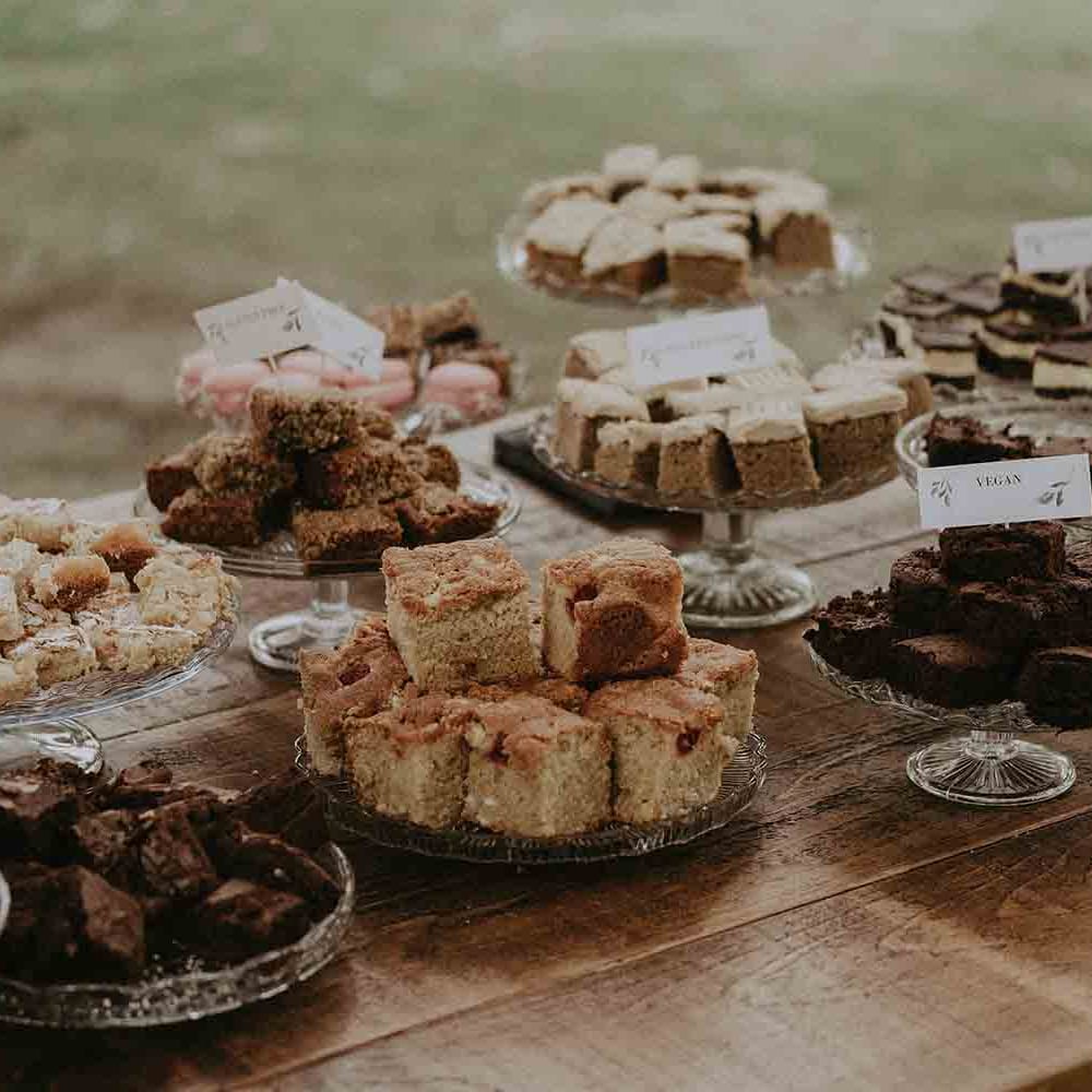 DIY cake table with bakes from family and friends