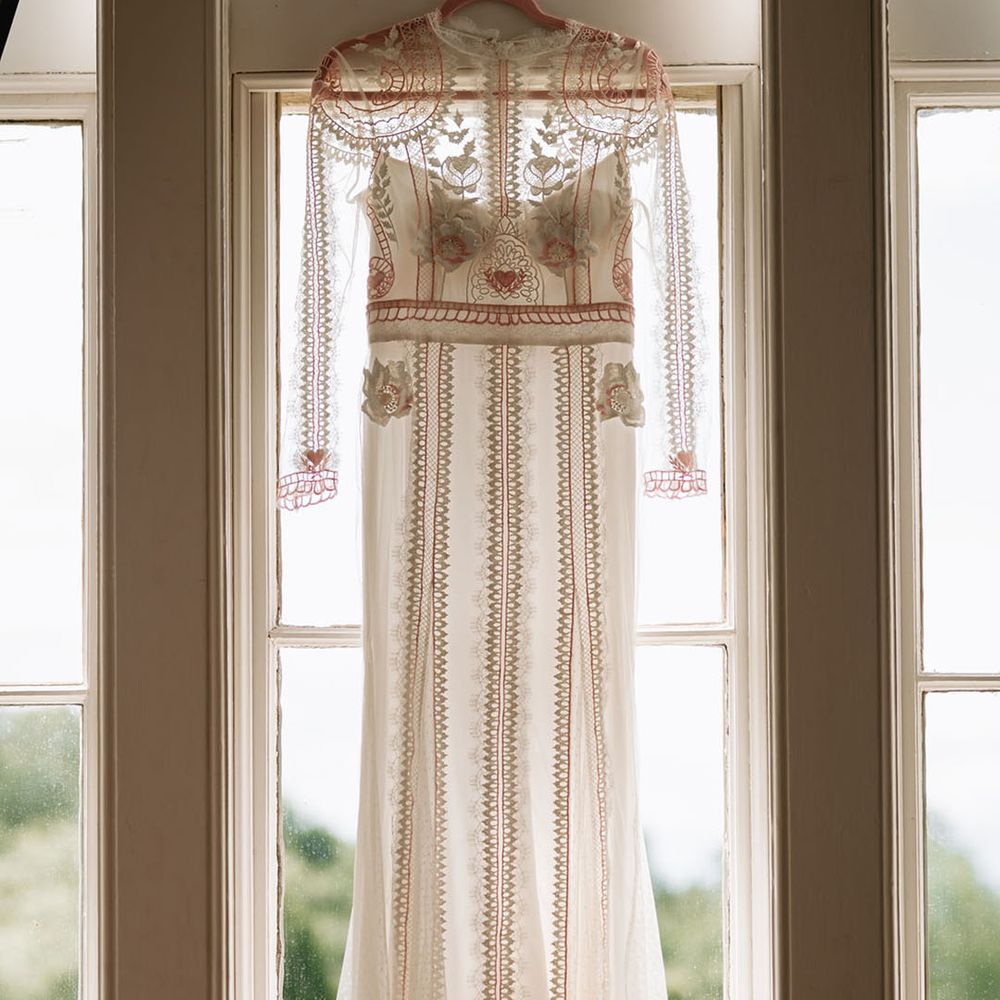 Bride's lace long sleeve wedding dress by Temperley Bridal 