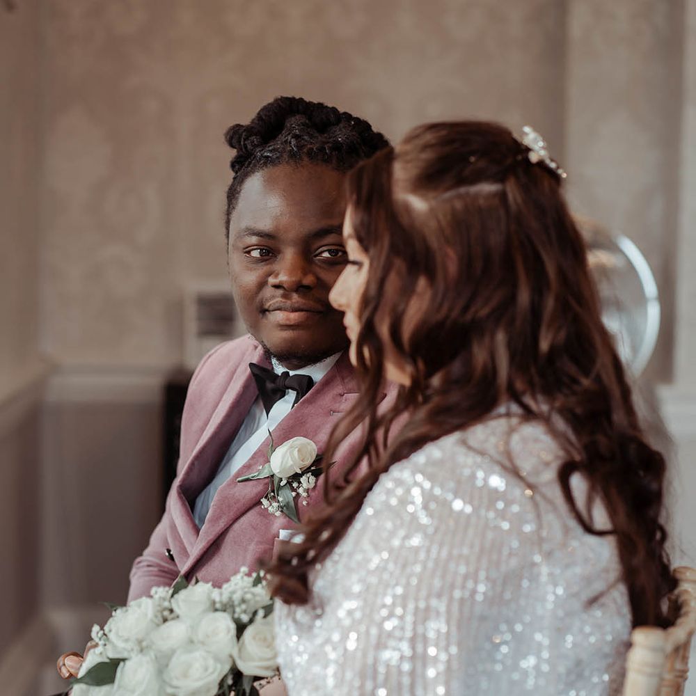 Bride & groom look at one another during ceremony