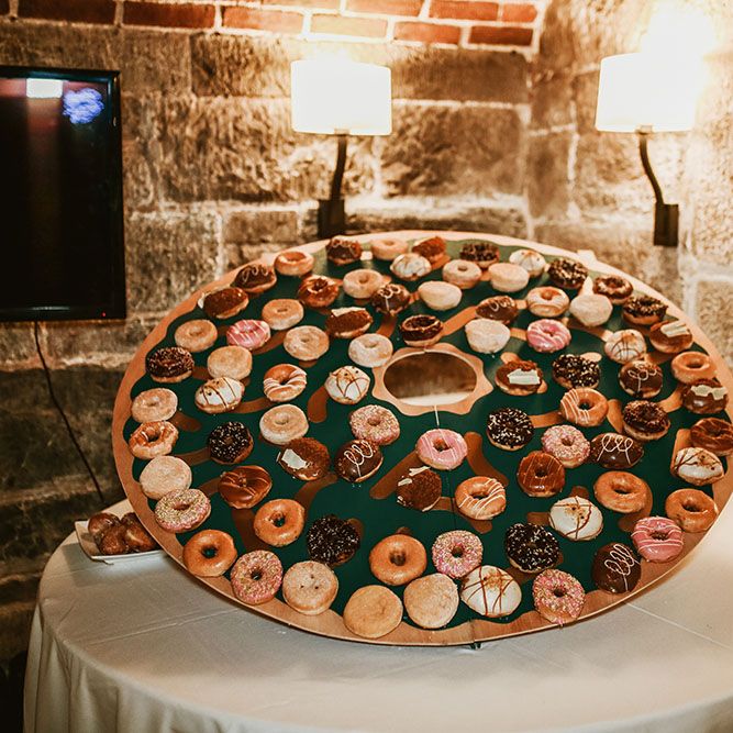 DIY round doughnut wall for Cornwall wedding on the beach