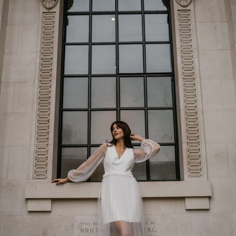 Story Of My Dress gown with sheer sleeves and layered skirt 