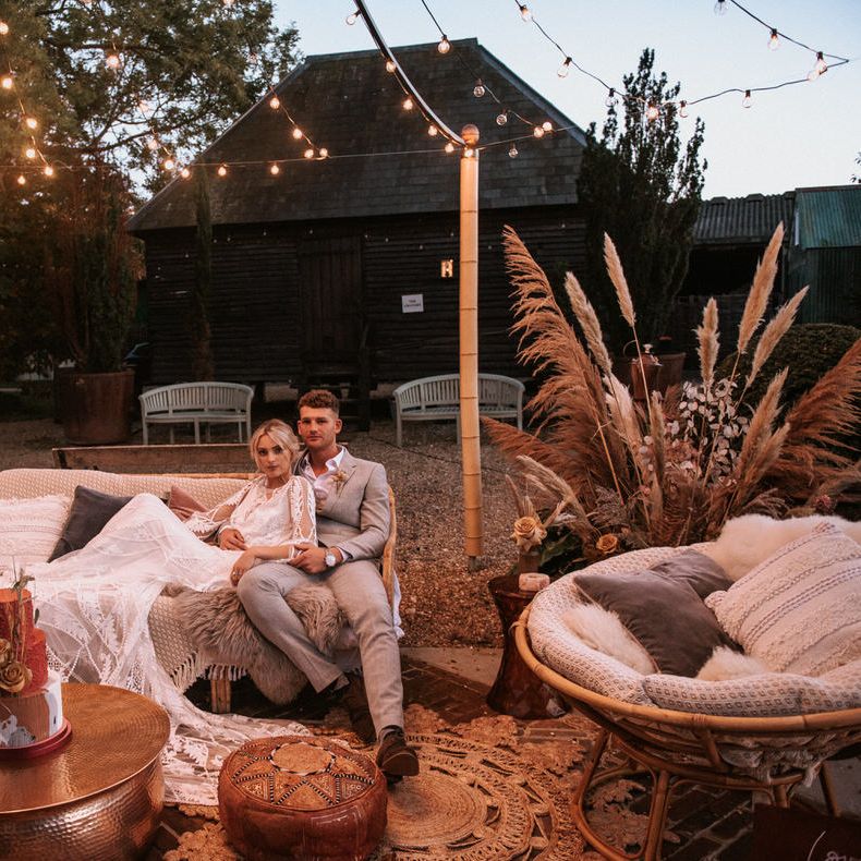 Bridge and groom relax at intimate wedding reception