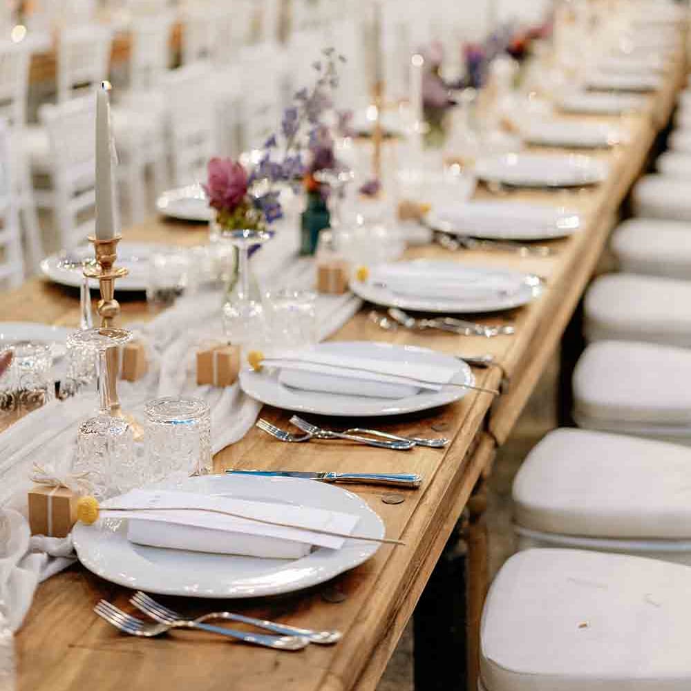 Gorgeous long wedding tables with pink flower decor