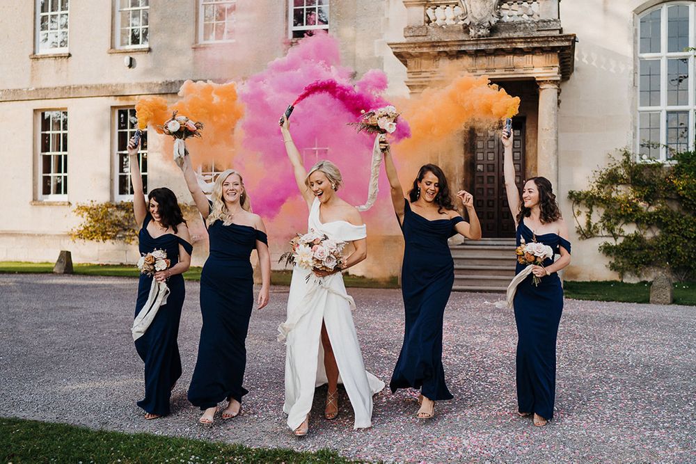 what color flowers go with navy blue bridesmaid dresses Navy blue dresses with purple flowers
