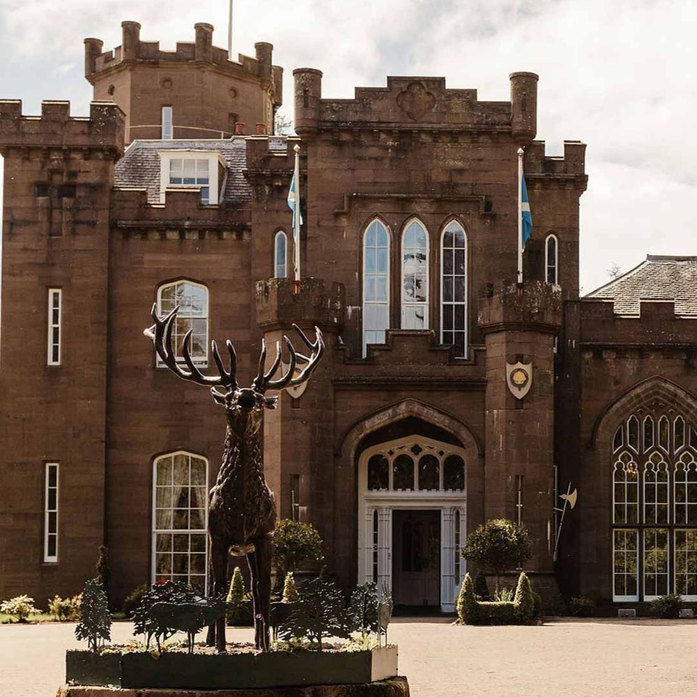 Exterior of large stag statue outside of Drumtocthy Castle wedding venue Scotland