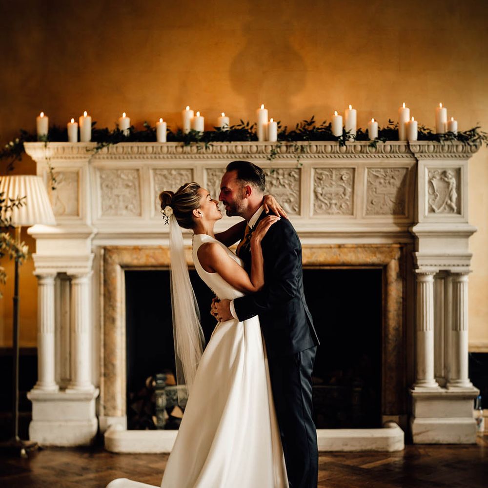 Hampton Court House wedding country house in Surrey with traditional wedding outfits 