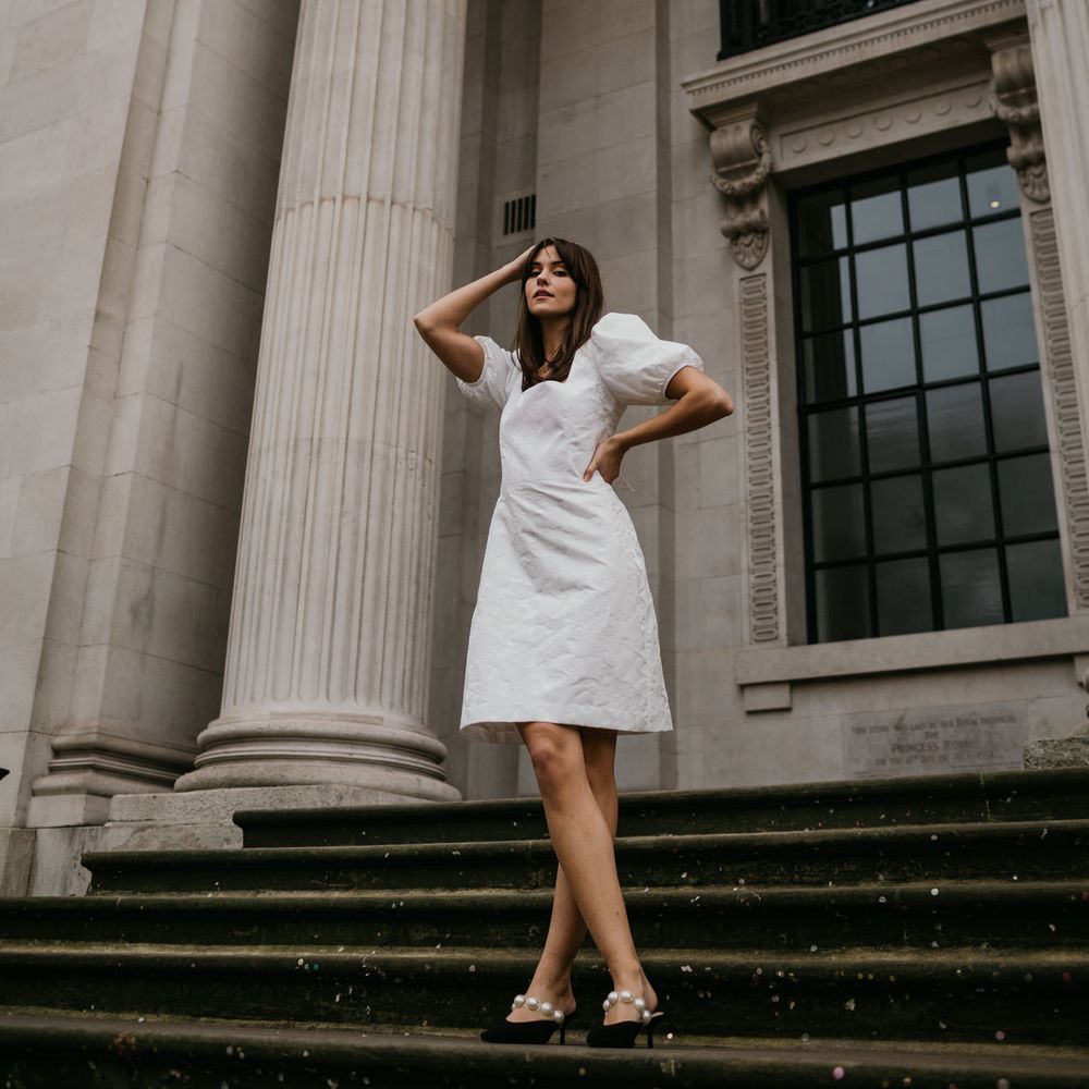 Bride in Story Of My Dress knee length wedding dress