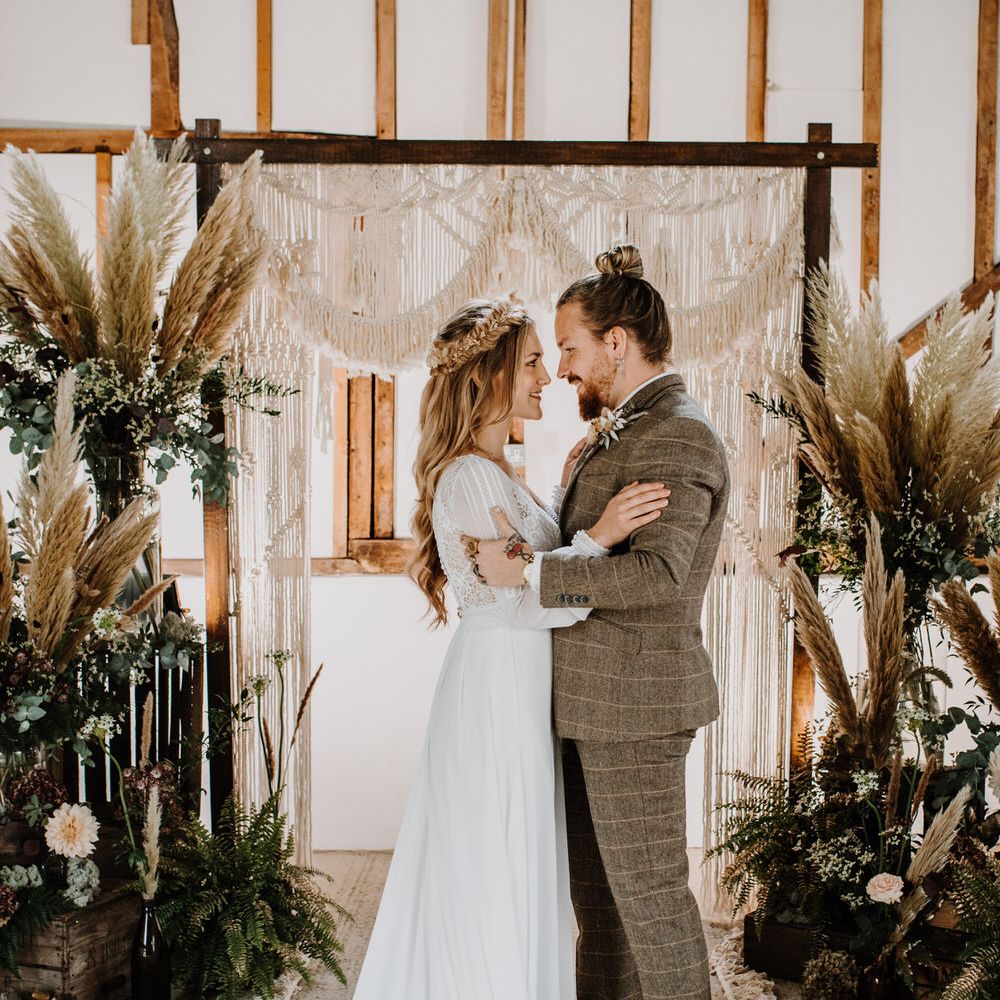 Macrame wedding backdrop for barn wedding