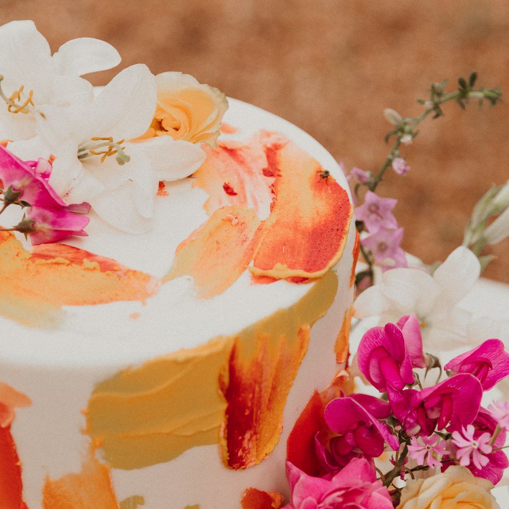 Wedding cake featuring colourful brush strokes 