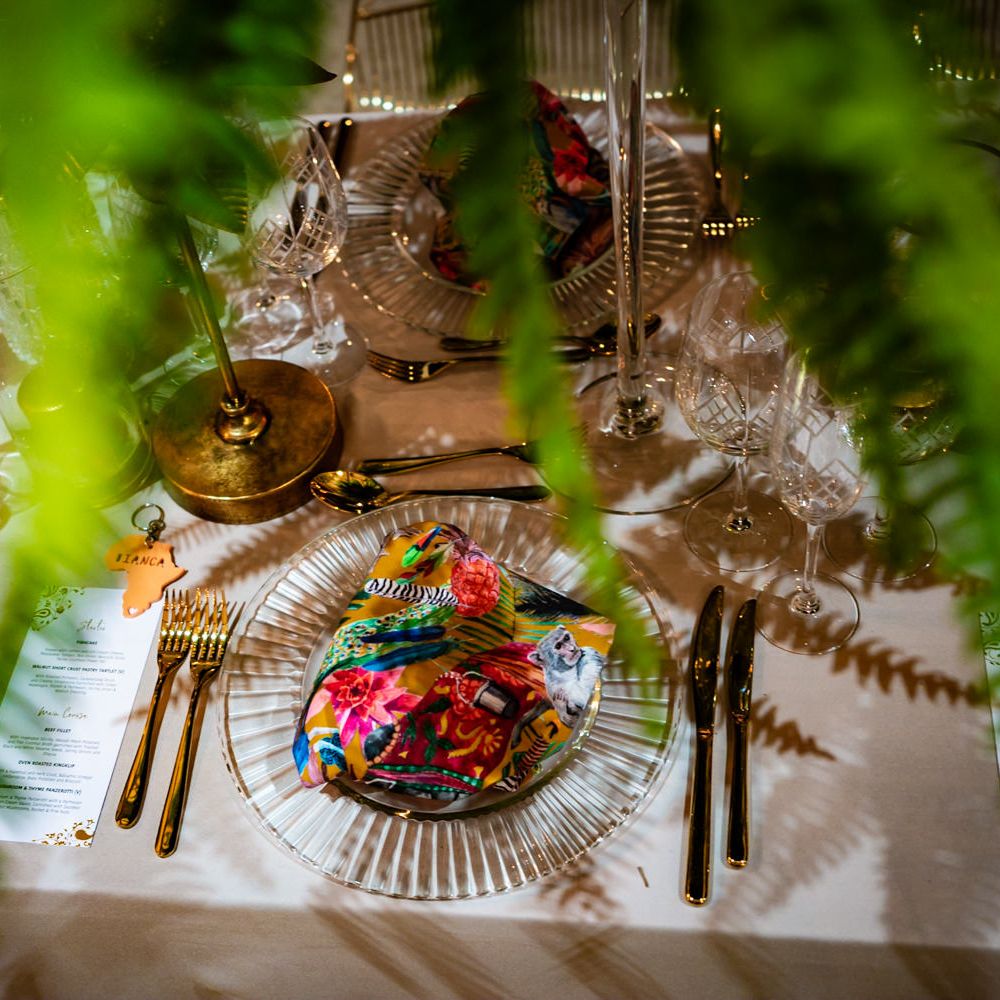 Brightly coloured wedding place setting
