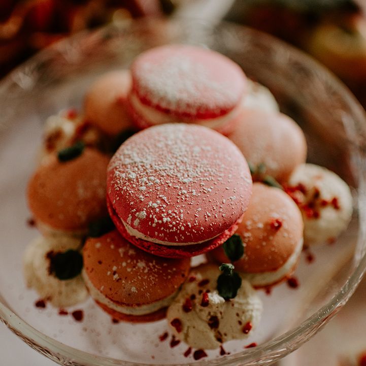 Pink macaroons dusted with icing 