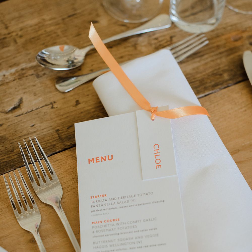 Orange and white menu card stationery 